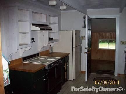 Kitchen looking into entry/mud room