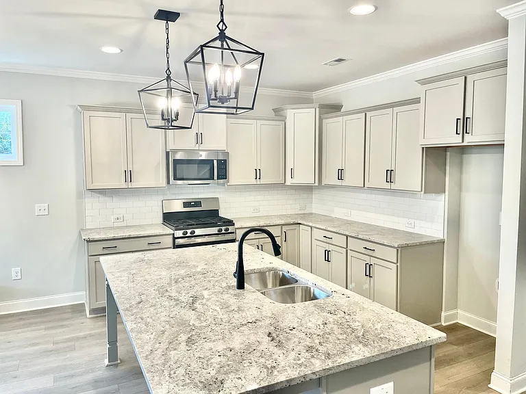 Open concept kitchen, room for barstools at island