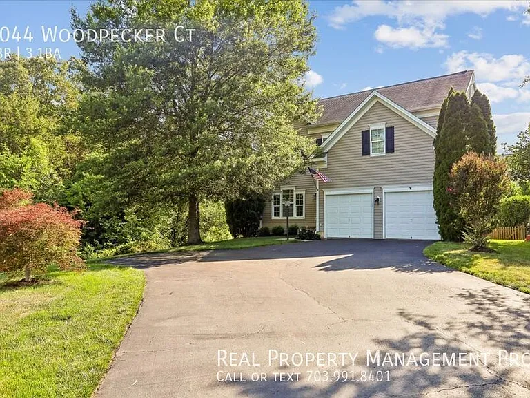 9044 Woodpecker Ct — Photo 34