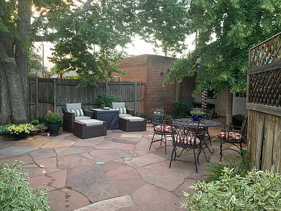 Back courtyard. Entrance to garage in back.