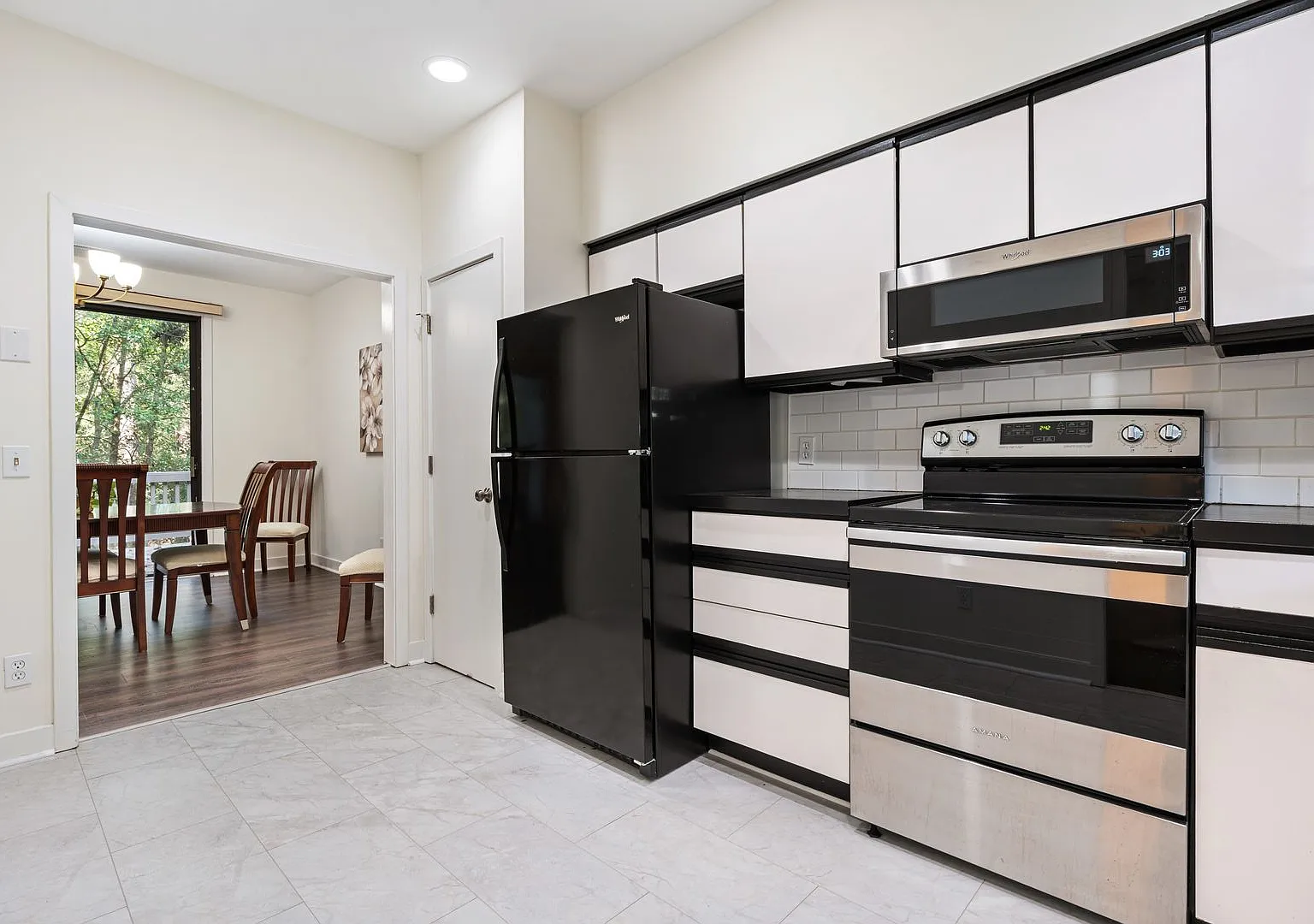 Updated Falconbridge Townhome with Community Amenities — Photo 3