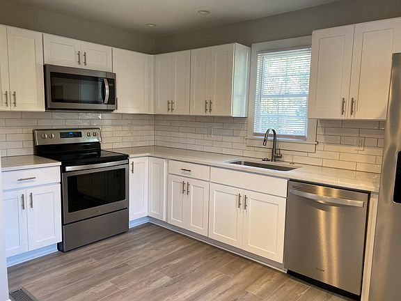Brand new, modern kitchen filled with light
