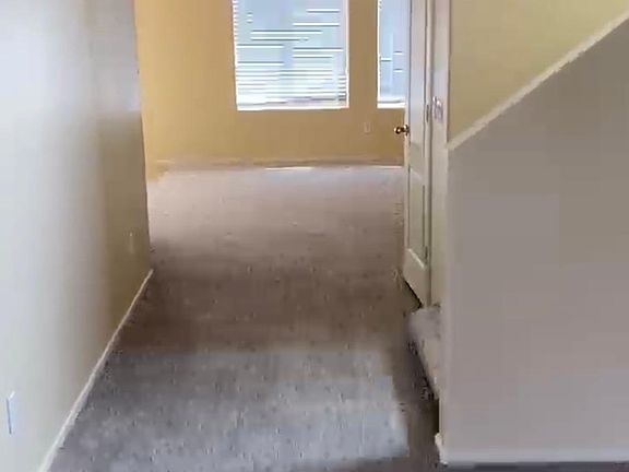 Entrance into home. 2 living areas.