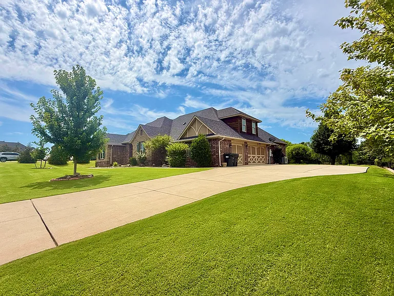 Extra long drive way gives room for multiple vehicles for your family beyond parking in the garage.