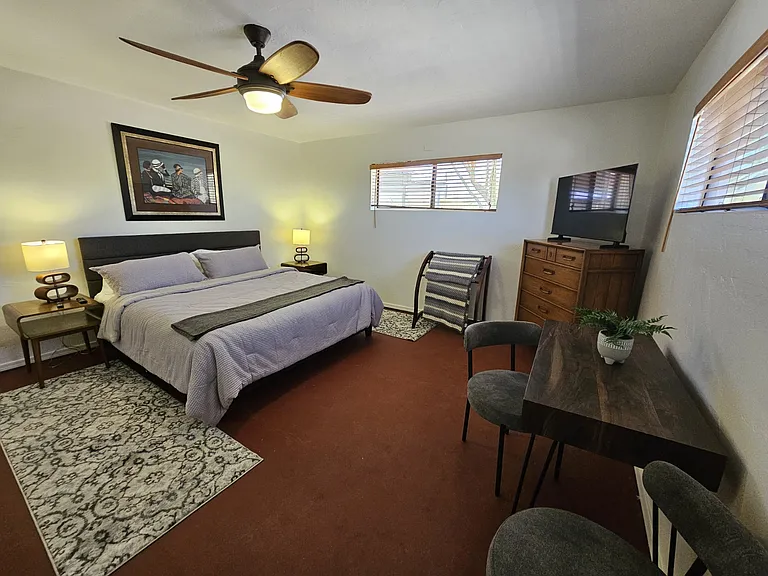 MBR has a 43" Smart TV, another dedicated work space with writing desk and chairs. Large dresser and closets.