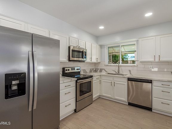 5th image of 11241 N COGGINS Drive