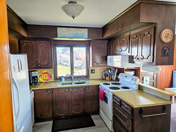 Kitchen with stove, oven, microwave