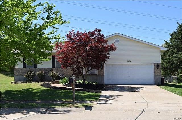 Welcome home! 2104 Blossom Lane, Arnold, MO 63010.  This charming home in tucked in on a cul-de-sac with a huge back yard! Tax records indicate .87 of an acre!!