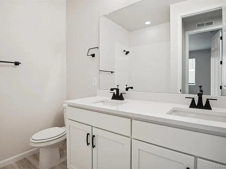 Guest Bath - Five piece Full Bath with upgraded countertop, cabinets and dual vanity sinks