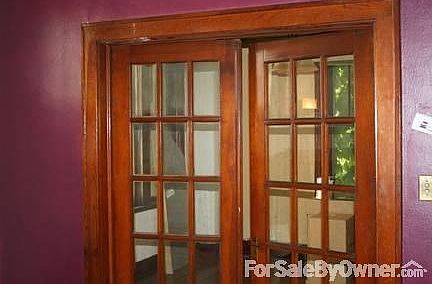 Beautiful wood work throughout home
						:
						This is the entry into the dining room.