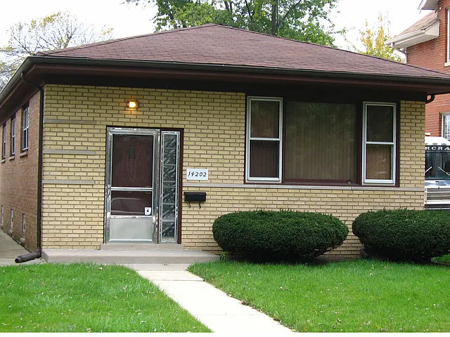 14202 S Wallace Ave photo 1