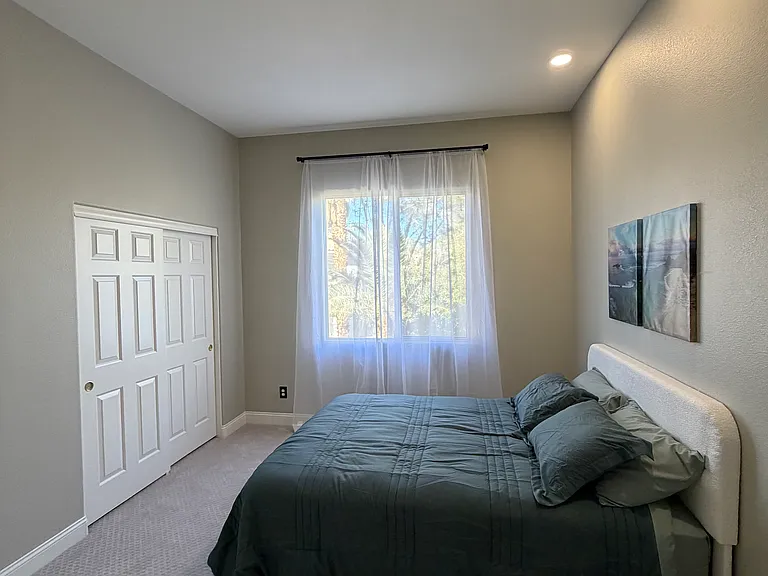 Bedroom with closet and natural light