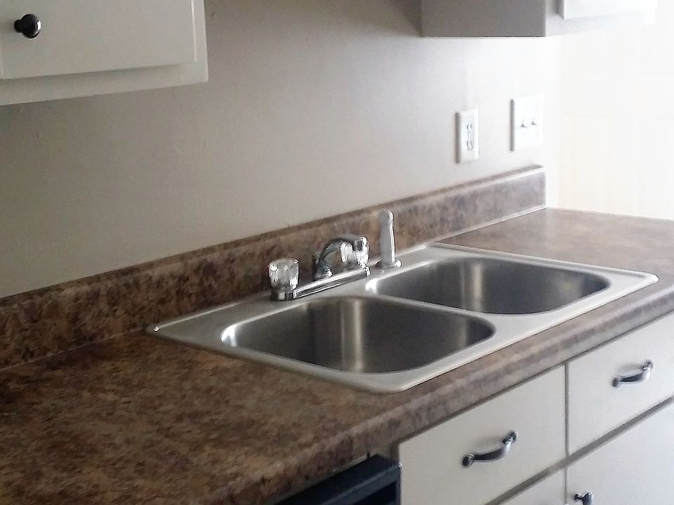 Kitchen furnished with diswaher, stainless steel refrigerato