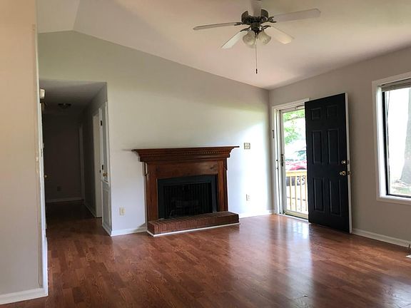 Living room with functioning fireplace