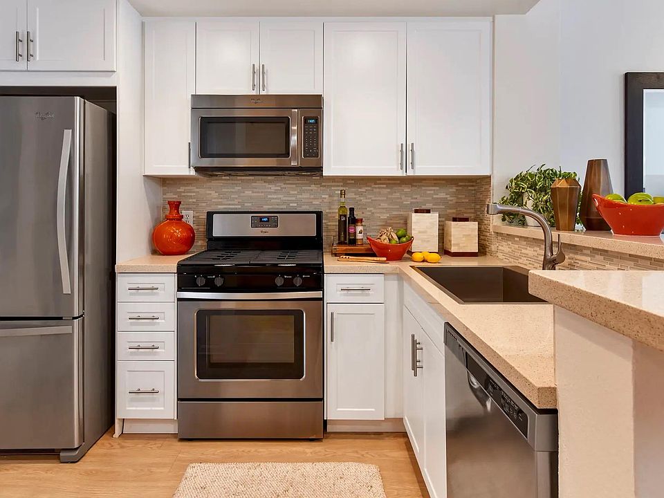 Spacious open kitchen with adequate storage (pantry not visible in photo)