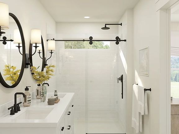 Primary bath with glass shower enclosure