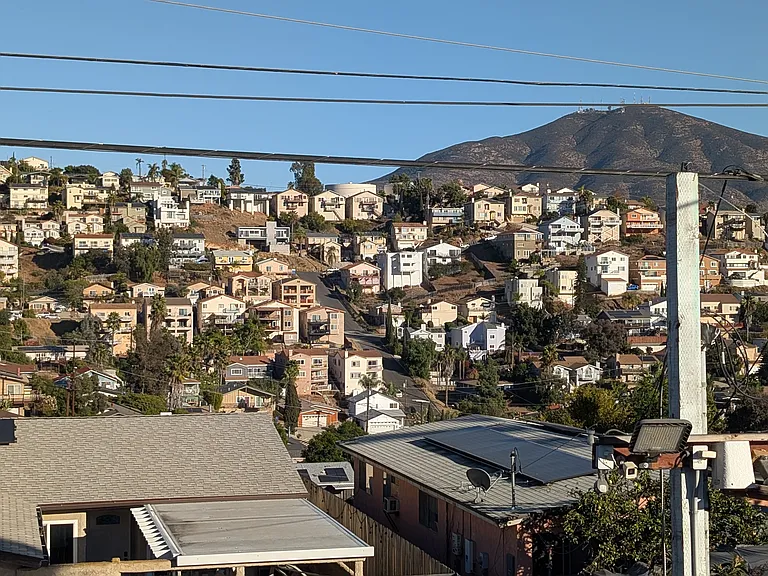 Views from the living room and bedroom. The temp power pole is being removed this week.