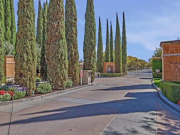 Welcome to the lushly landscaped, lovely, and gated Sereno! It will not disappoint you.