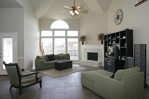 Elevated ceilings, great natural night and a stone fireplace