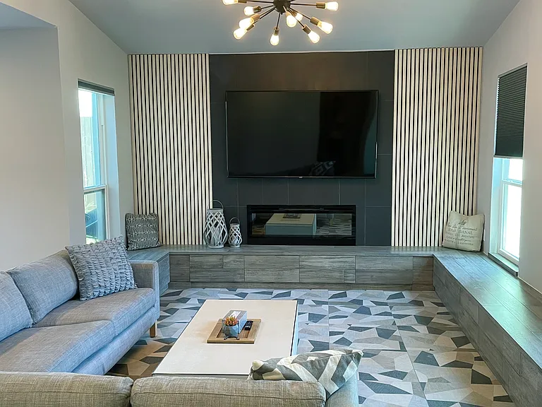 Living Room with 75-inch Smart TV with Urban Style Sleek Electric Fireplace