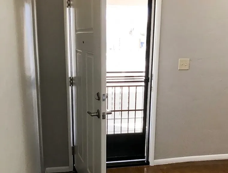 Front door entry way to living room.