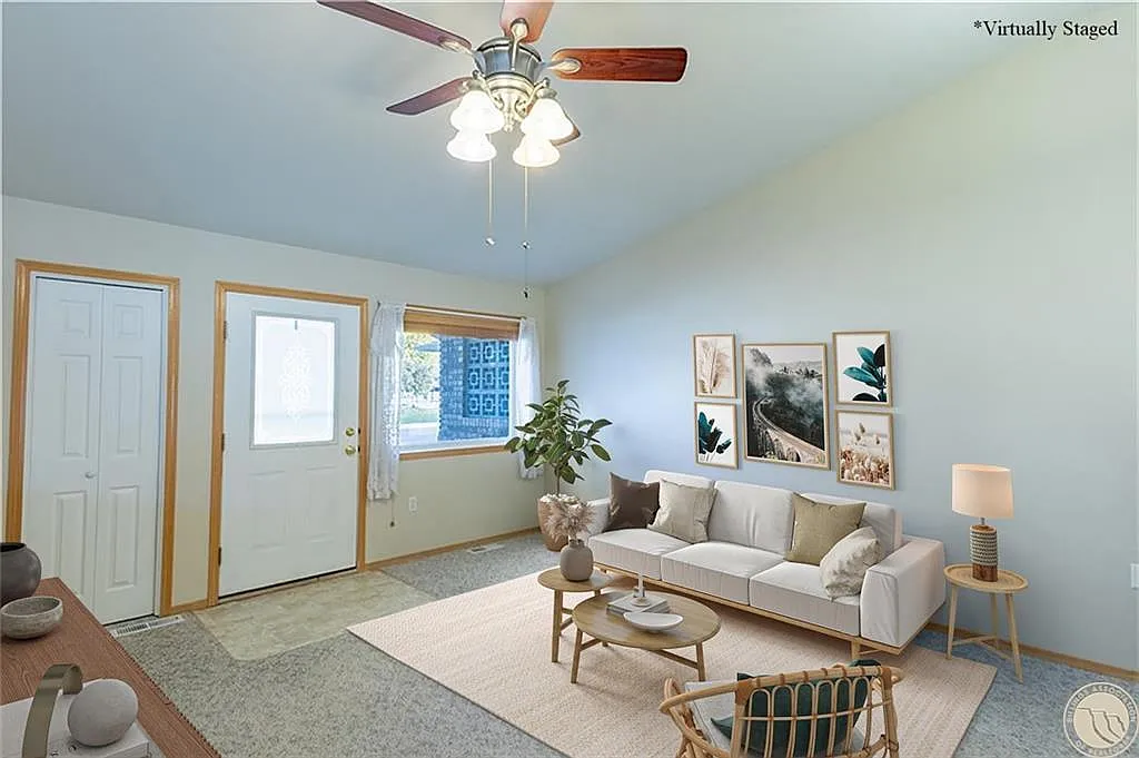 Staged main floor living room, cathedral ceilings - 3854 Avenue E
