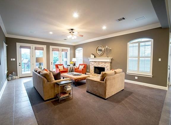 Family room with wood burning fireplace