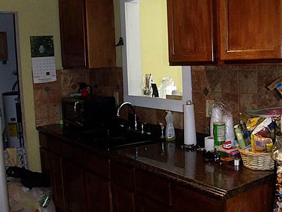 A window over the kitchen sink...good for daydreaming while you work!!