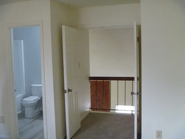 Upstairs bedroom facing front.