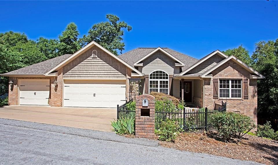 Welcome Home to 7 Rosedale Ln.  Includes lot next door for a total of .96 acres of privacy!