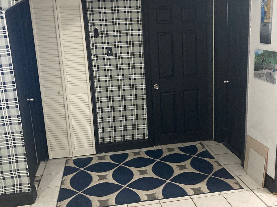 hallway to bedrooms, right door is this listing, bathroom in middle, roomates room on left