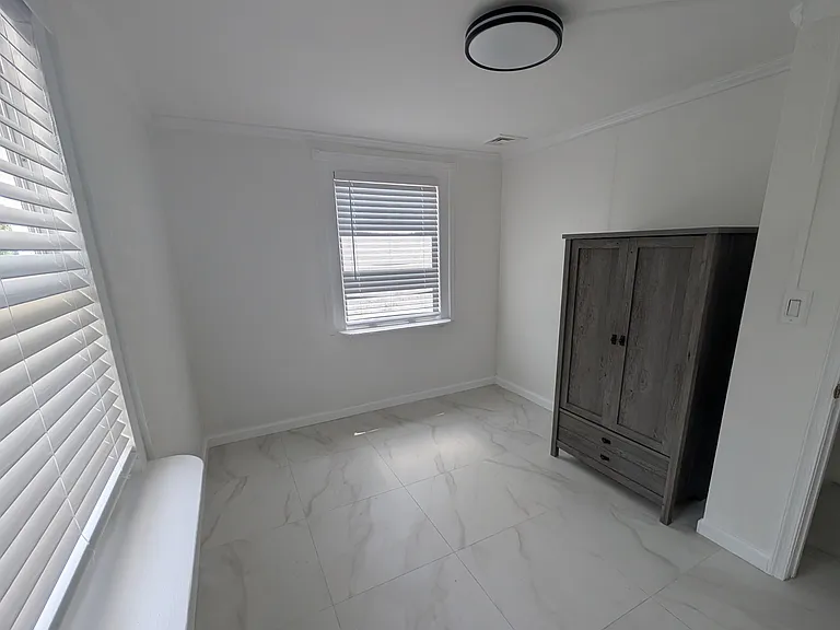 Second Bedroom facing door.