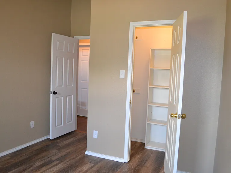 Walk-in closet in bedroom #3.