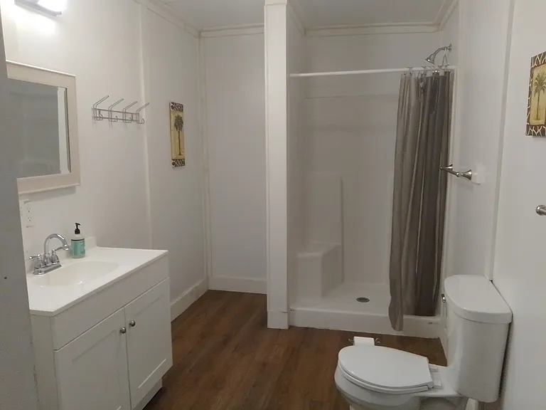 Large bathroom with a walk in shower.