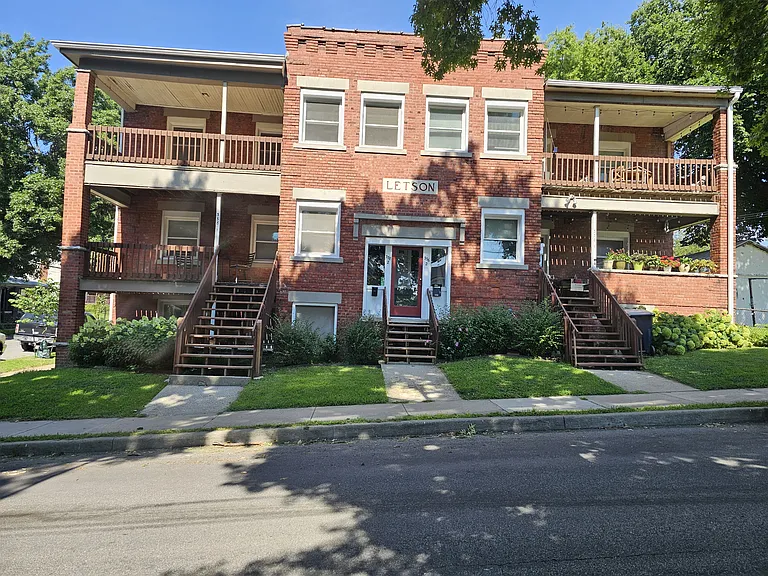 Available unit is middle unit on left, exterior stairs