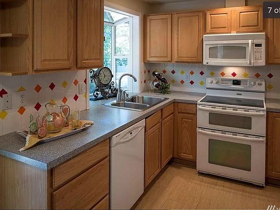 Recently updated kitchen. Full size appliances and natural light bay window.