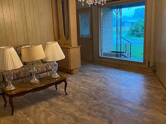 formal living room, it's raining outside.