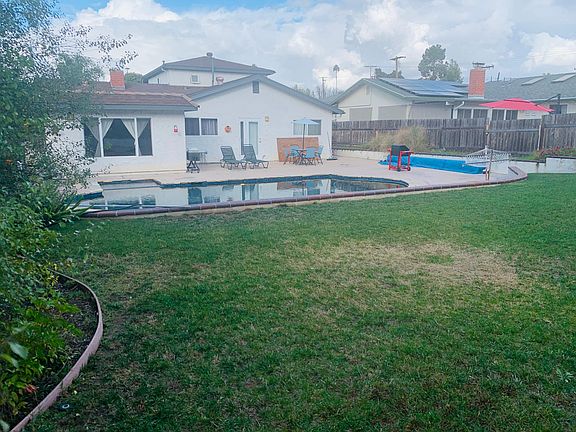 Backyard pool and nice grass area.