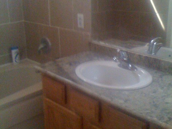 master bath with granite counter tops