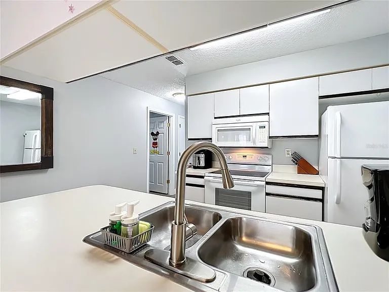 2731 N Poinciana Blvd #114 — Photo 40