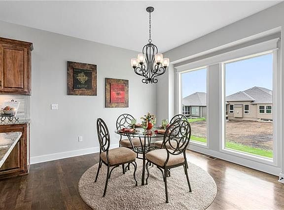 Bright and spacious eat-in area. PHOTO IS FROM ANOTHER COVENTRY VILLA. 1902 NE 111TH COURT IS UND