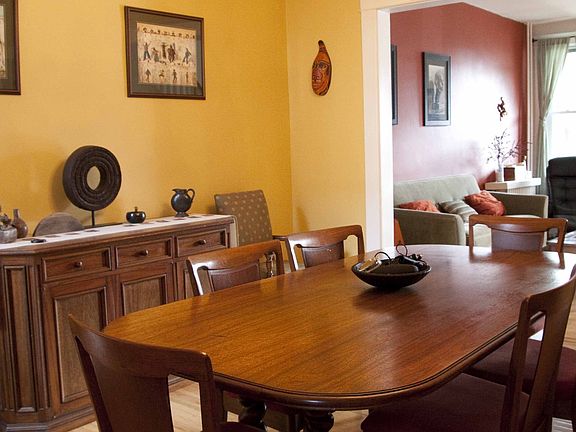 Dining room is ample and great for big family dinners or parties. 