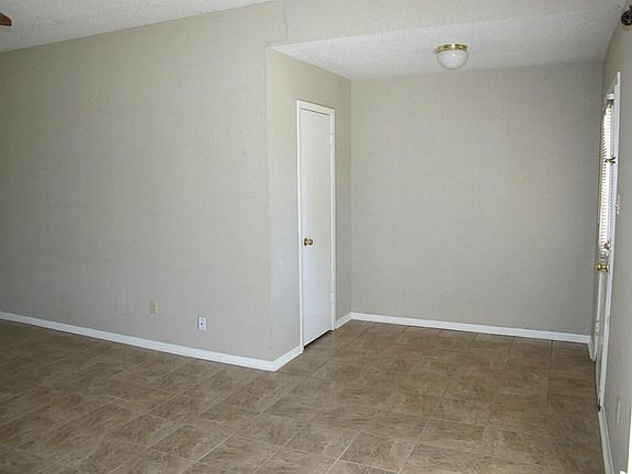 Step inside the foyer and you will find a coat closet for extra storage in front of you. Room in the