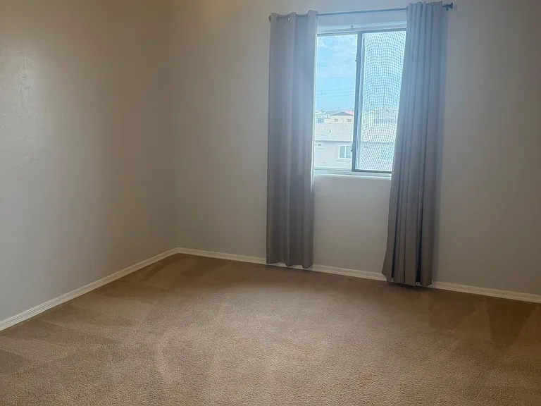 Master Bedroom - All bedroom Windows have sunscreens for additional comfort and sun drapes for comfort.