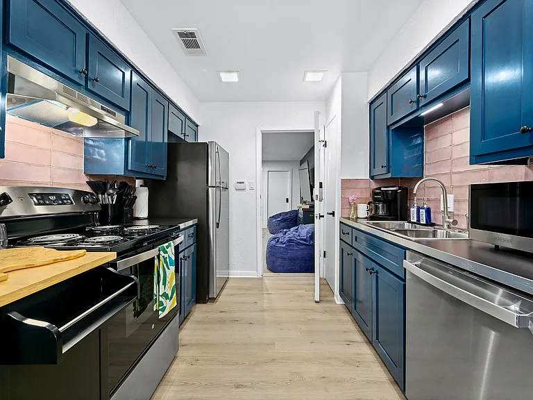Unit B fully stocked kitchen