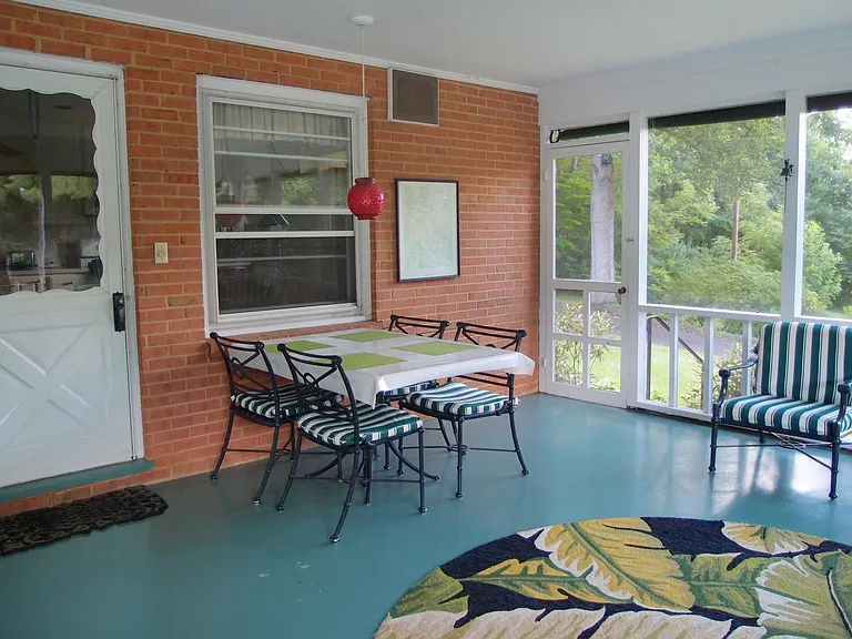Porch toward kitchen with pass through