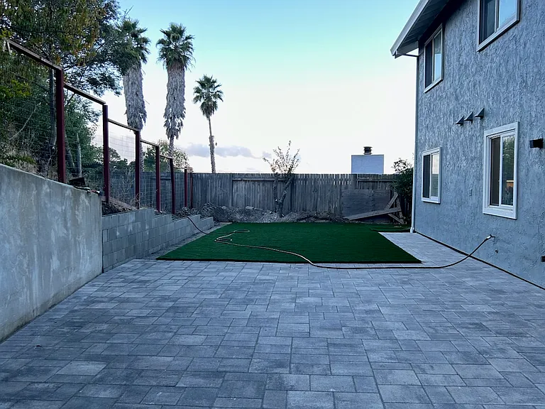 Yard was updated for low maintenance usable space