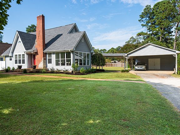 Exterior side with carport