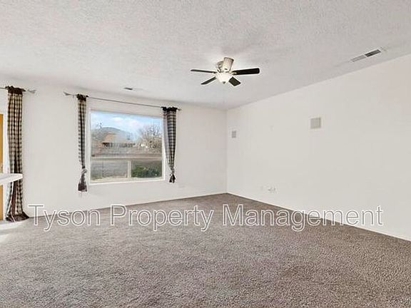 2nd image of 10309 Longmont Pl NW