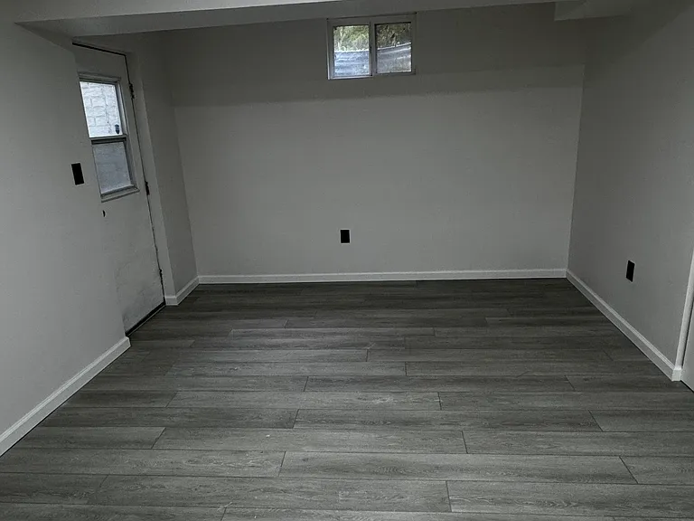 Area when you first walk in. Perfect for a small seating area, desk area, storage, couch and TV.